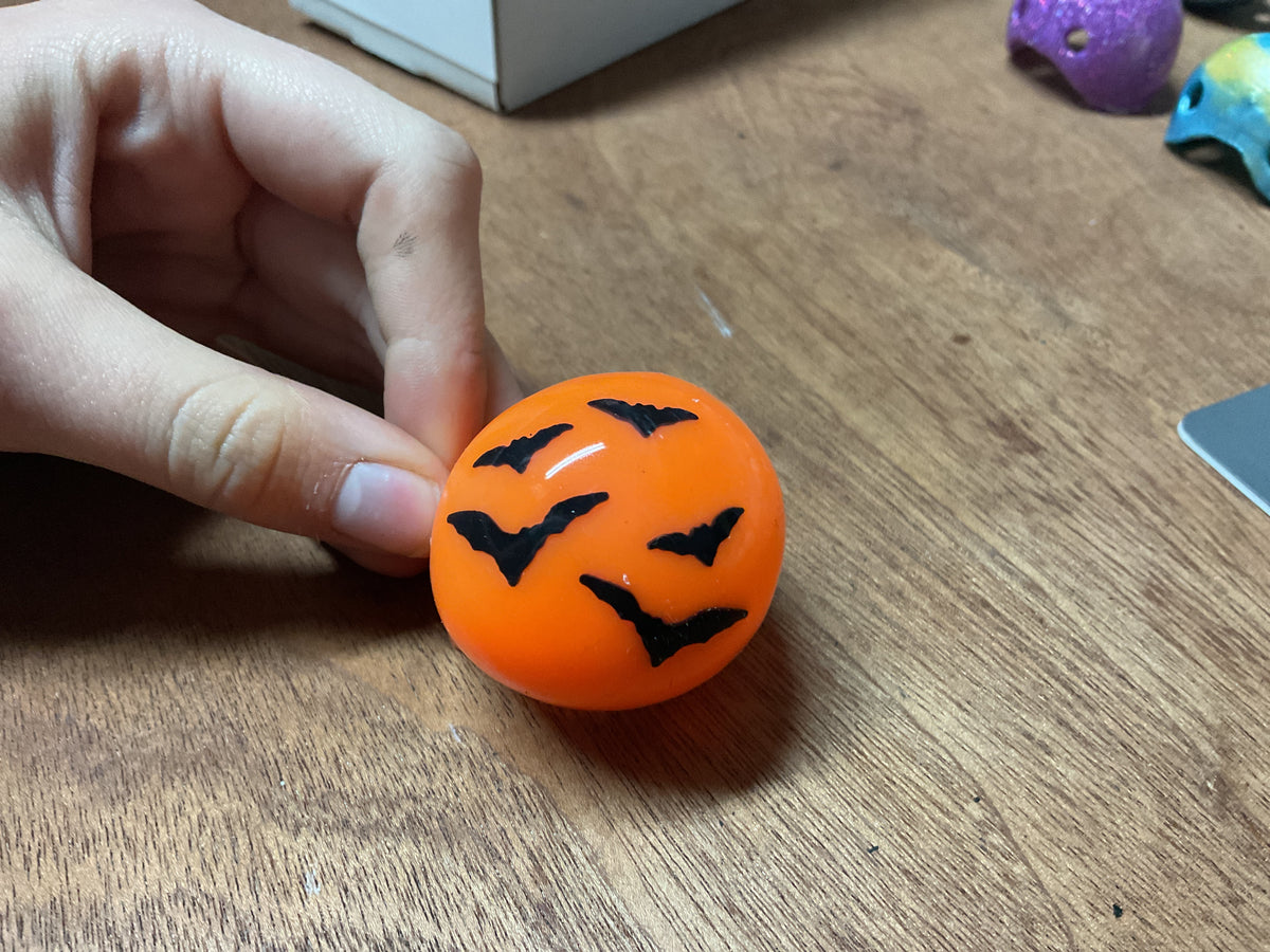 One-off Wonders    - Glow orange with black bats Joan Mankin(2025 batch)